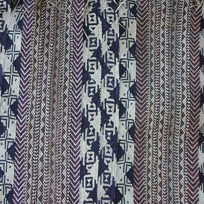 Close-up of a handwoven Swahili mat with geometric pattern
